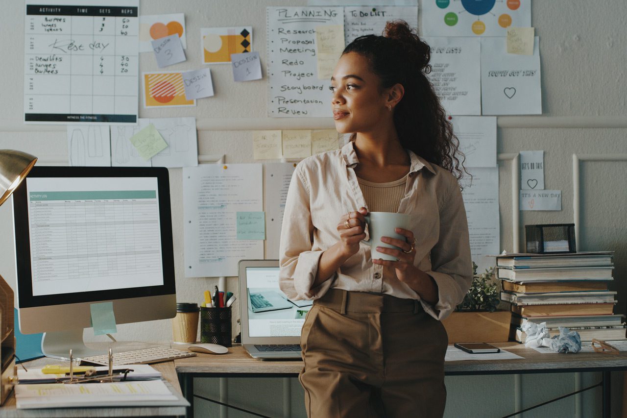 Businesswoman-standing-and-looking-contemplative