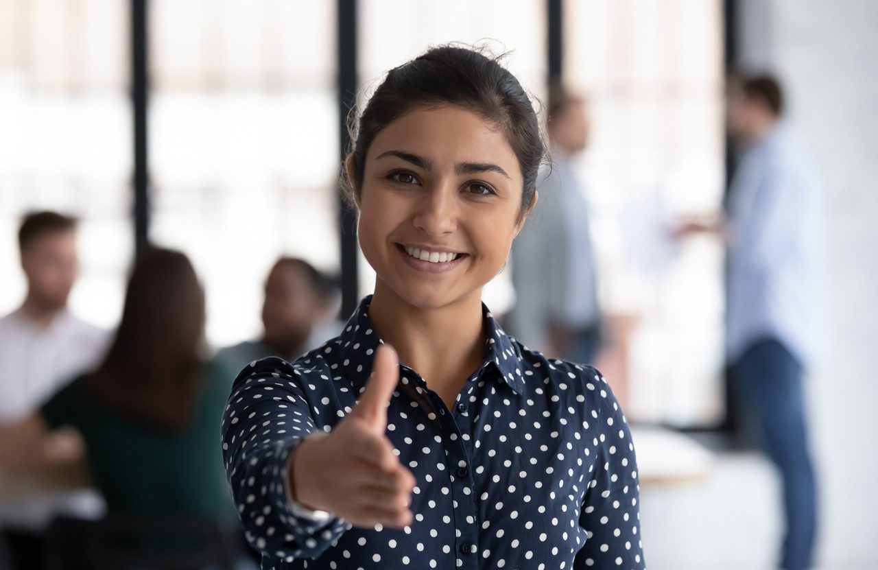 Friendly-boss-greeting-client-with-outstretched-hand