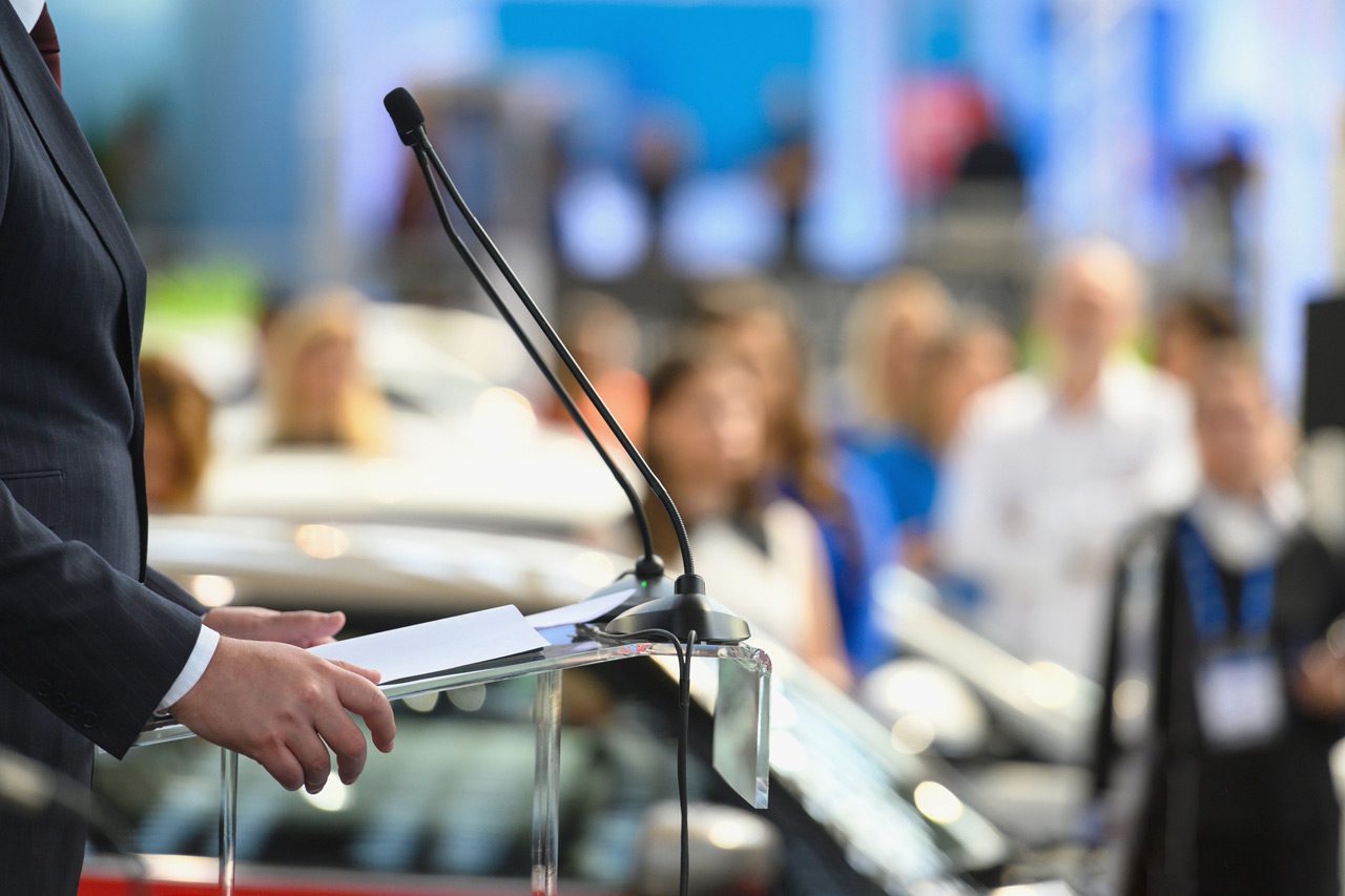 Politician-speaking-publicly-from-the-lectern