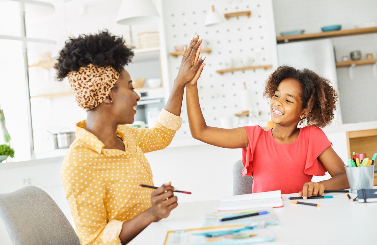 a-mother-and-daughter-sharing-a-high-five